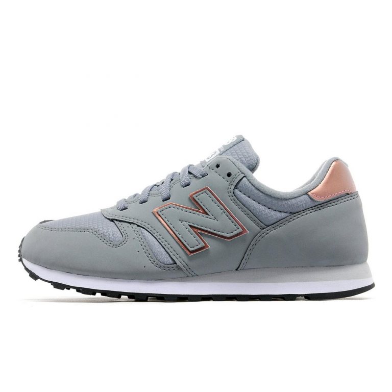 new balance 373 sneakers in black and rose gold
